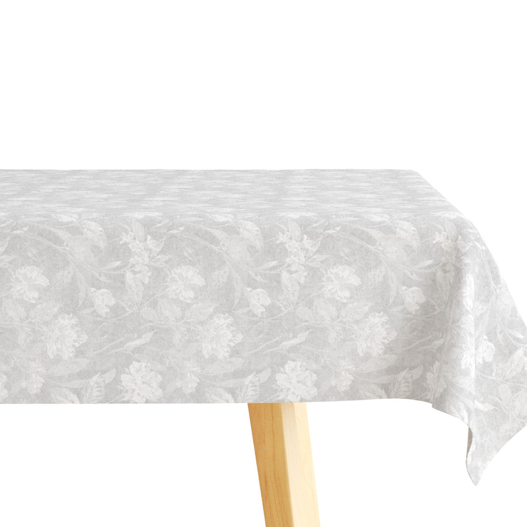Carducho Flor – textilvaxduk med blommor i diskret look, bord