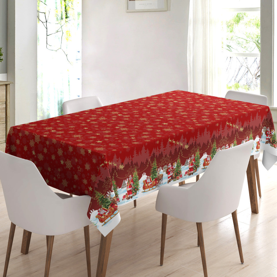 Nisseby – Röd julvaxduk med tomten och ett snöklätt landskap, miljö