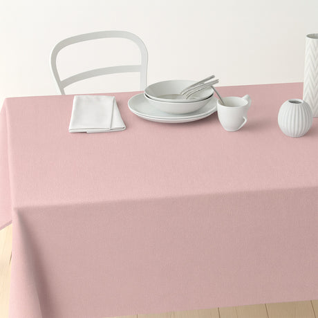 Nordfavn Dean Dämpad Rosa – Enfärgad textilvaxduk i linnelook, på bord