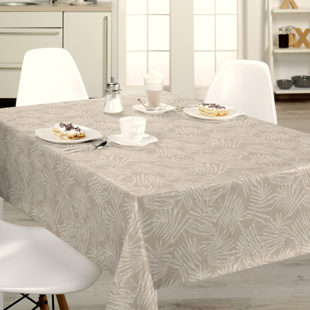 Nordfavn Hojas Beige – Vaxduk med ljust bladmönster i linnelook, miljö