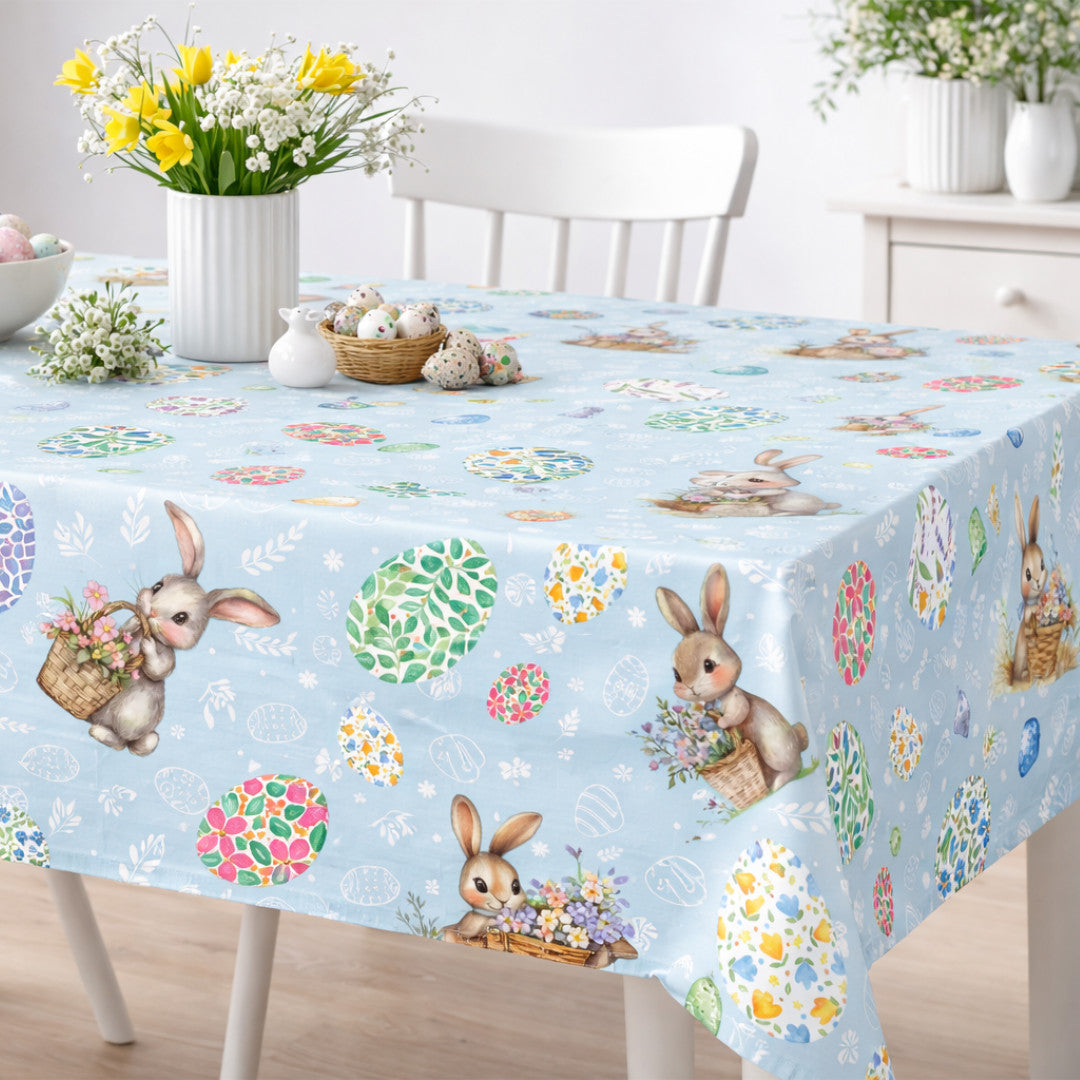 Påskhare Blå – påskvaxduk med harar och blomsterägg