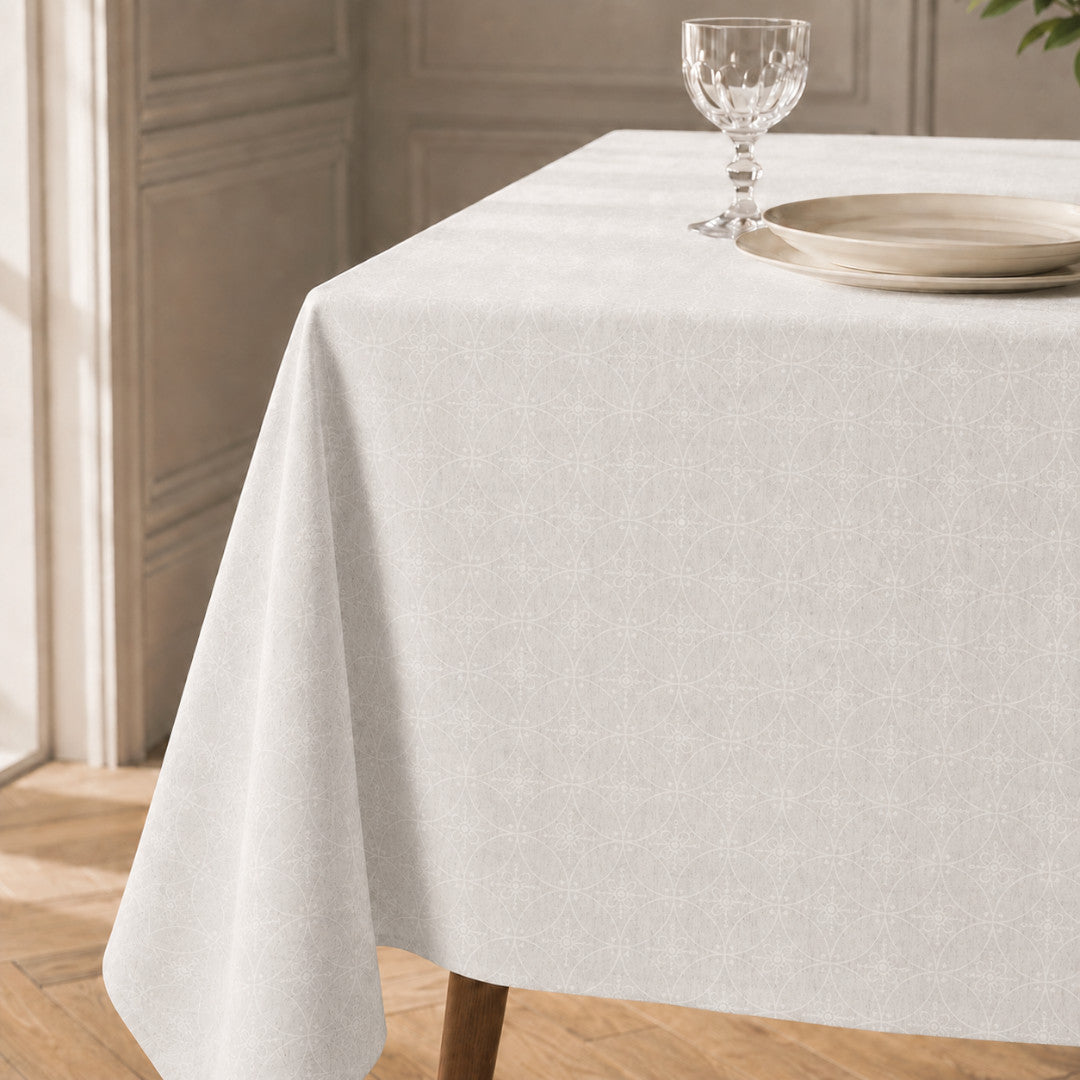 Rivera Blanco – Jacquardvävd textilvaxduk i offwhite 180 cm bred, hörn