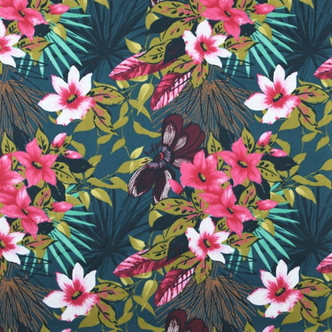 Ahuna – Textilvaxduk med blommor på petrolfärgad bakgrund, 155 cm bred