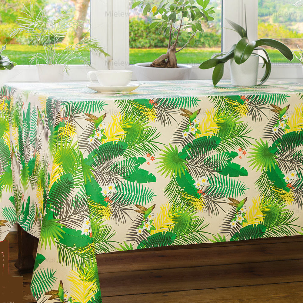 På bordet Ormbunksblad - Vaxduk med ormbunkar, blommor och kolibrier