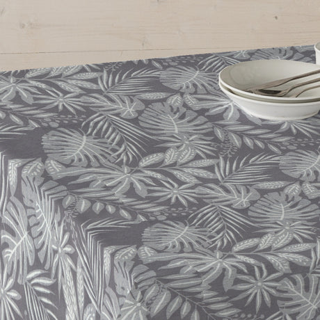 Casiopea Grå - Textilvaxduk med tropiska blad