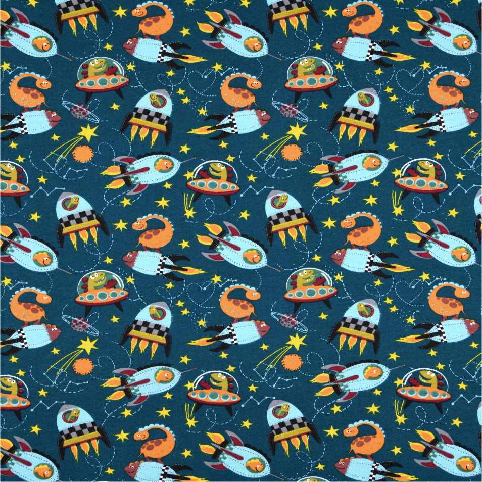 Dinofuzzy Blågrön – Textilvaxduk med rymdskepp, 155 cm bred