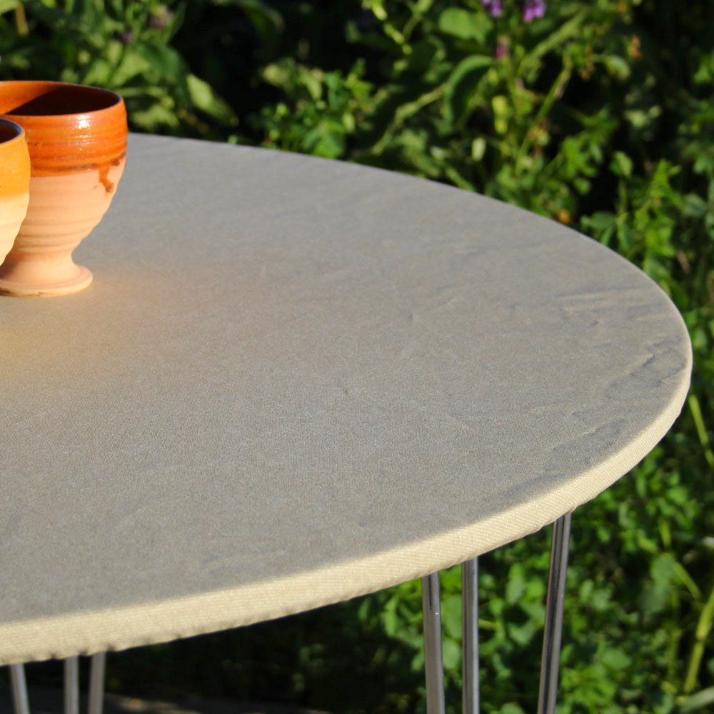 Enfärgad textilvaxduk sand - rund textilvaxduk med resårkant