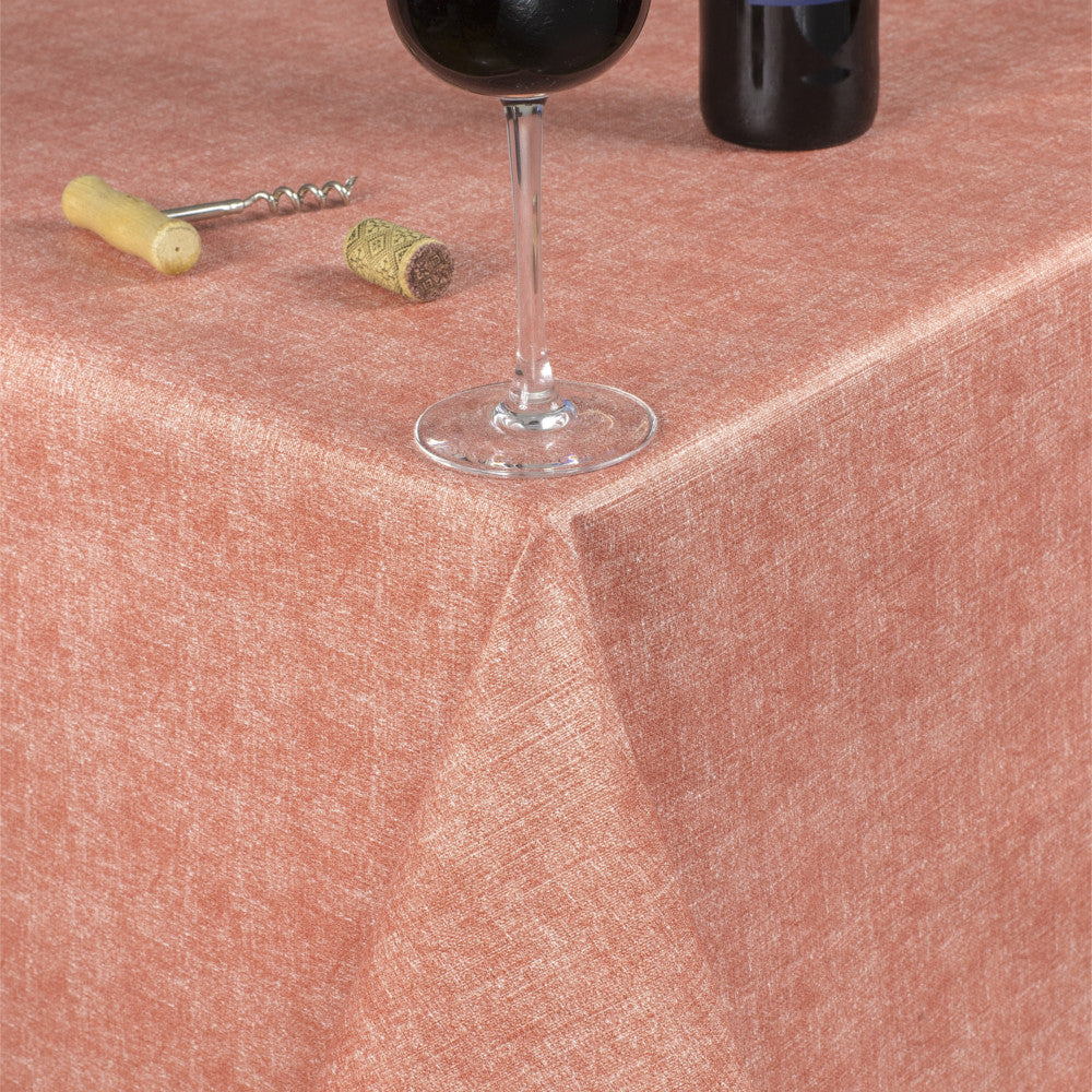 Enfärgad textilvaxduk i lax färg präglad med linnelook