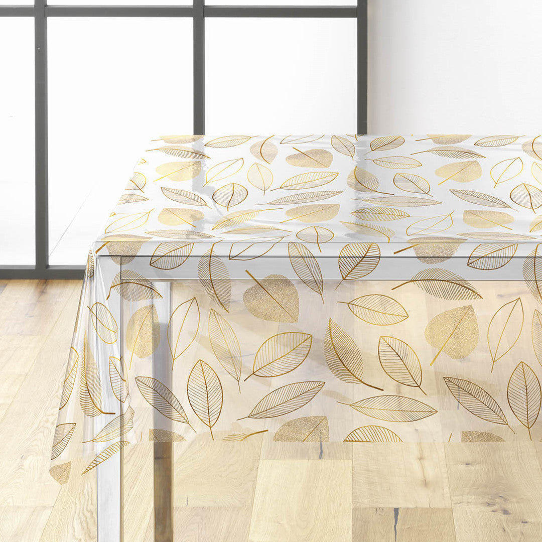 Kraftig genomskinlig vaxduk med streckblad och glittrig effekt på bordet