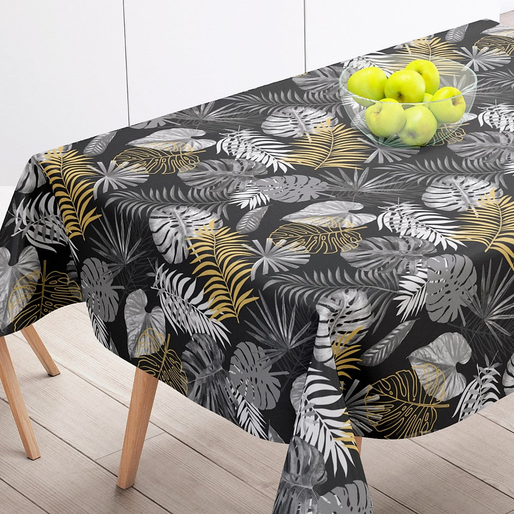 Vaxduk med bladmönster och lätt präglad på bordet