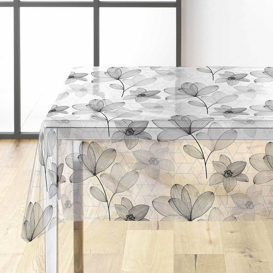 På bordet Filicity - Genomskinlig vaxduk med streckteckningar av blommor och blad