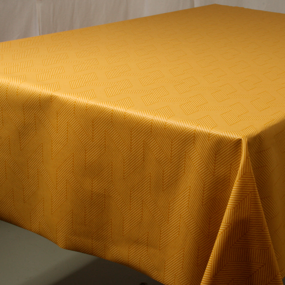 Flare Guld - Textilvaxduk med grafiskt mönster