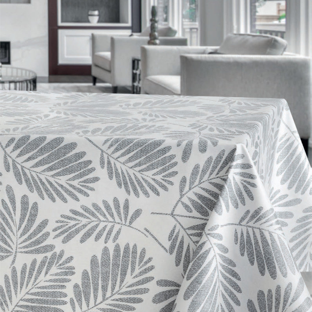 Miljöbild Grå Palmer - Vaxduk med palmblad på sandfärgad bas