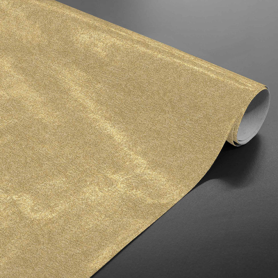 Enfärgad guld julvaxduk i metallic-look på rulle