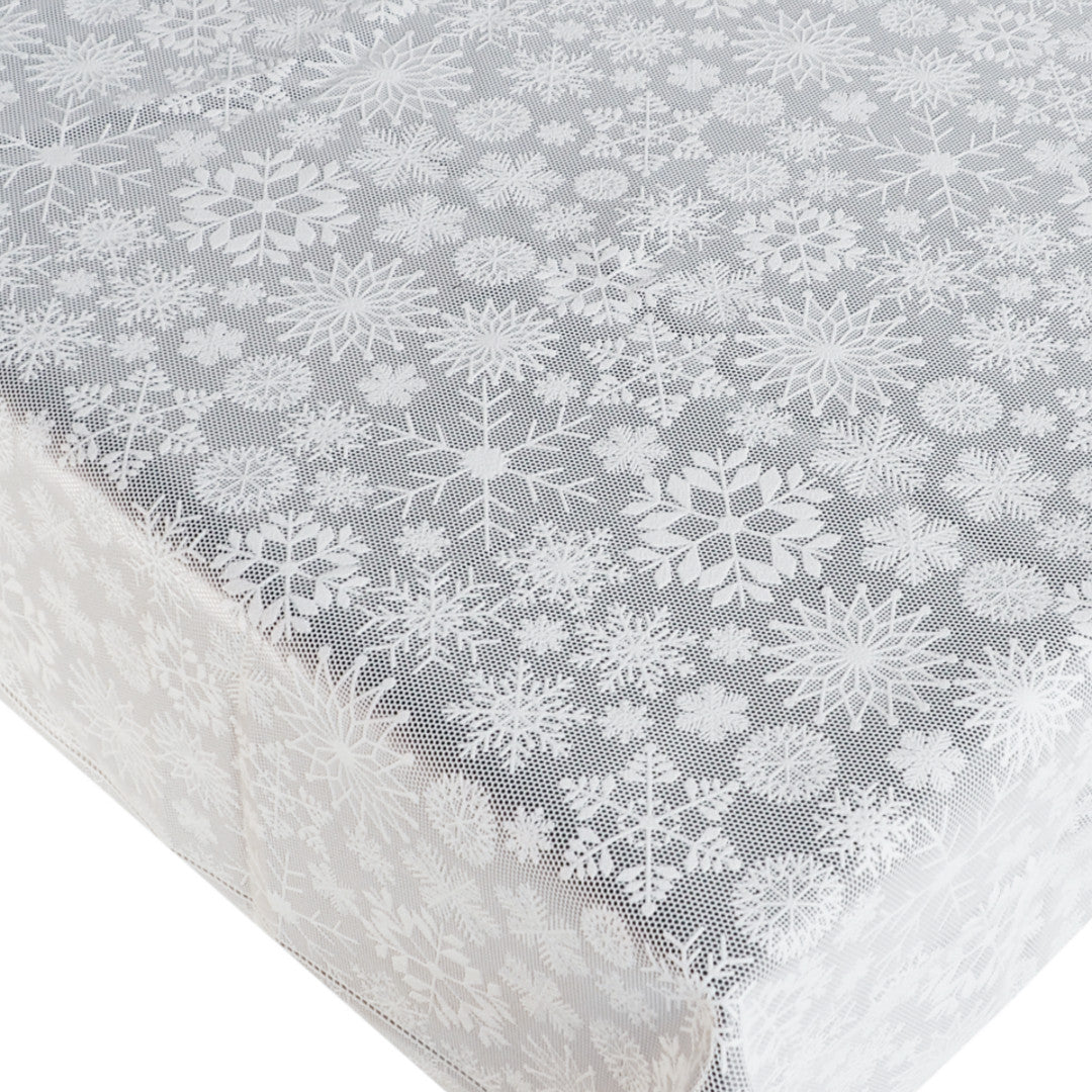 Spets vaxduk - Julvaxduk i spets med vackra iskristaller på bordetmukke iskrystaller