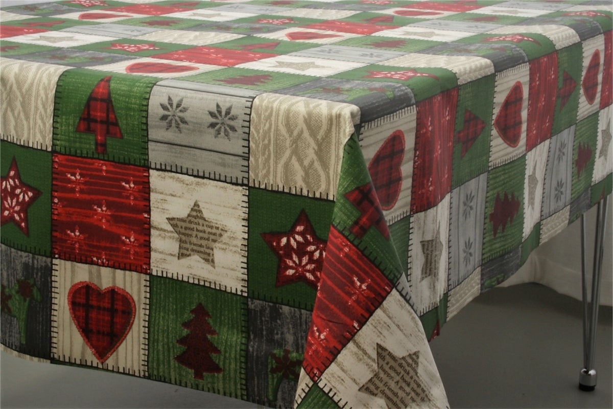 Julduk Scandy - Textilvaxduk med julmot i kvadrater - 155 cm bred