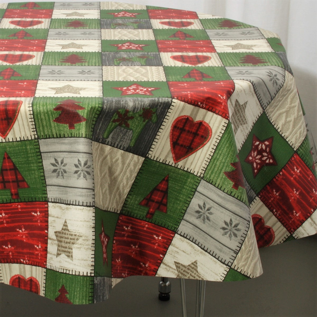 Julduk Scandy - Textilvaxduk med julmot i kvadrater - 155 cm bred