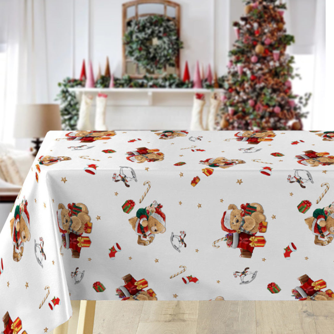 Julduk med söta nallar med tomtekläder och julklappar. På bordet