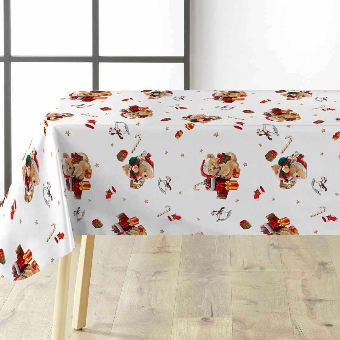 Julduk med söta nallar och julklappar. Närbild med dukning