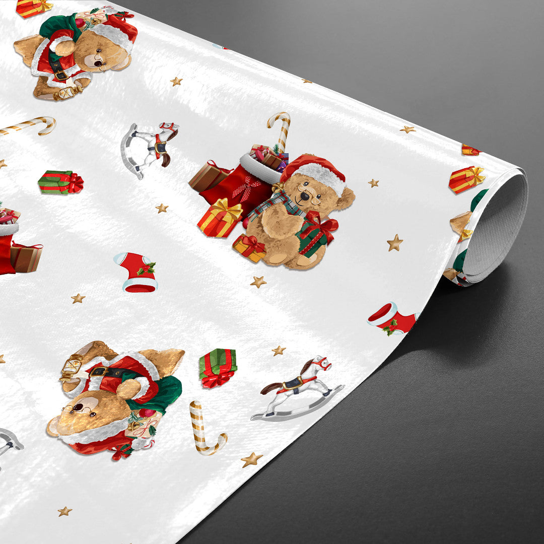 Julduk med söta nallar med tomtekläder och julklappar. Rullad på rör