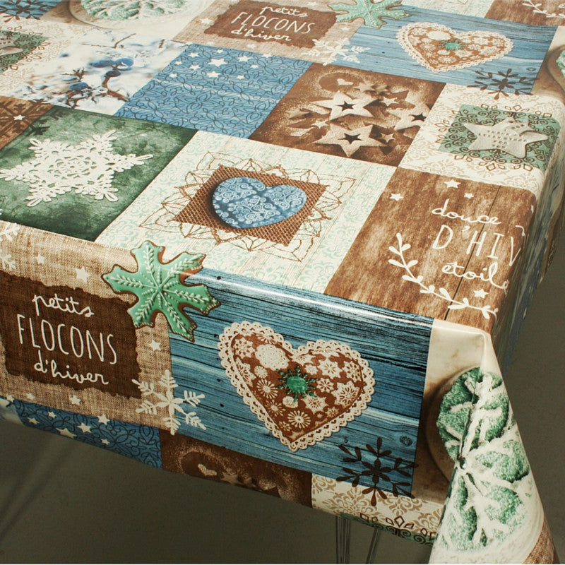 På bordet Små snöflingor - blå Julvaxduk Flocons