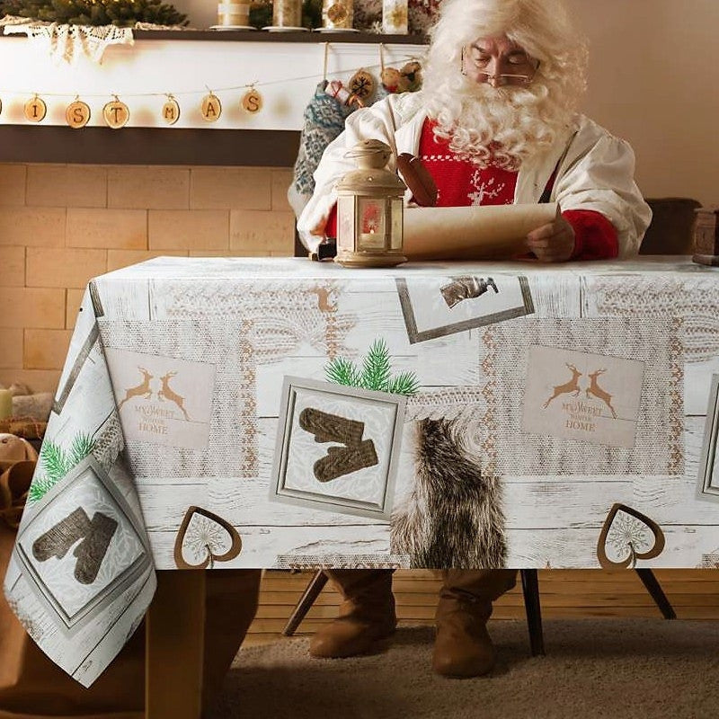 Julvaxduk - Skridskoåkning i juletid. Tomten sitter vid bordet