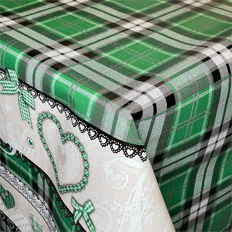 Hörnbild av julvaxduk Quiltad Jul grön