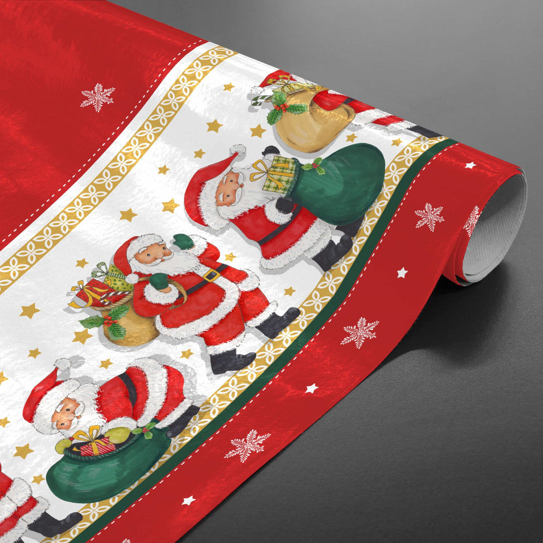 Jultomten med sin julklappar - julvaxduk på rulle