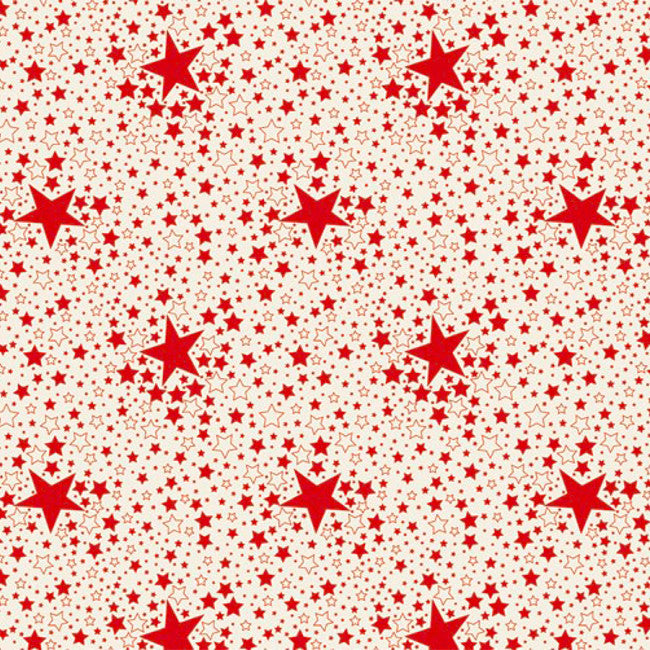 Stjärnhimmel Röd - Julduk med röda stjärnor på en vit bakgrund. Närbild