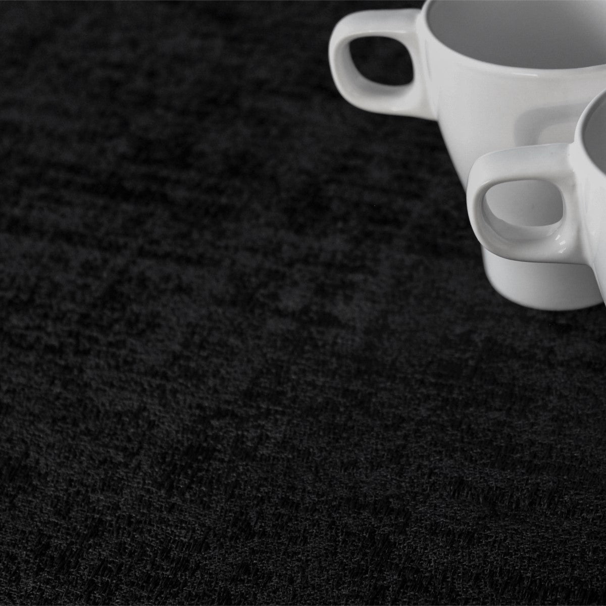 Morillo Luxxus Svart – jacquardvävd textilvaxduk, 140 cm bred