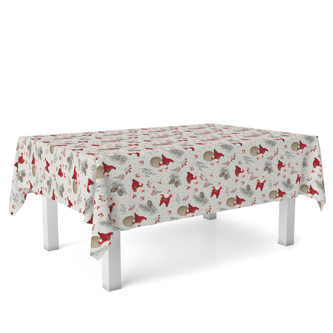 På bordet Navida Julbordsduk med jultomten med sin fyllda säck