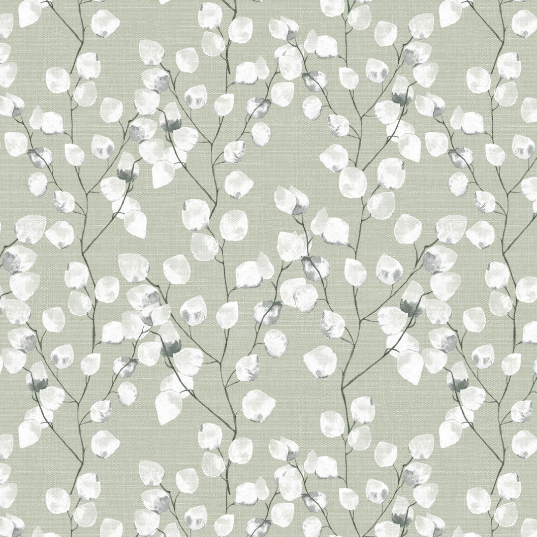 Närbild av Nova Green - ljusgrön vaxduk med vita blad