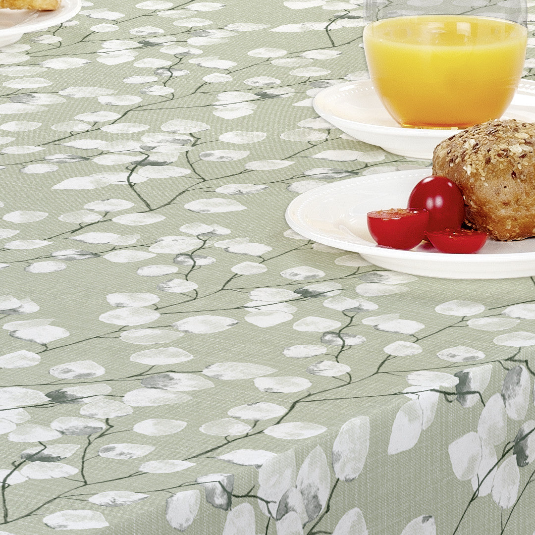 Dukat bord med Nova Green - ljusgrön vaxduk med vita blad