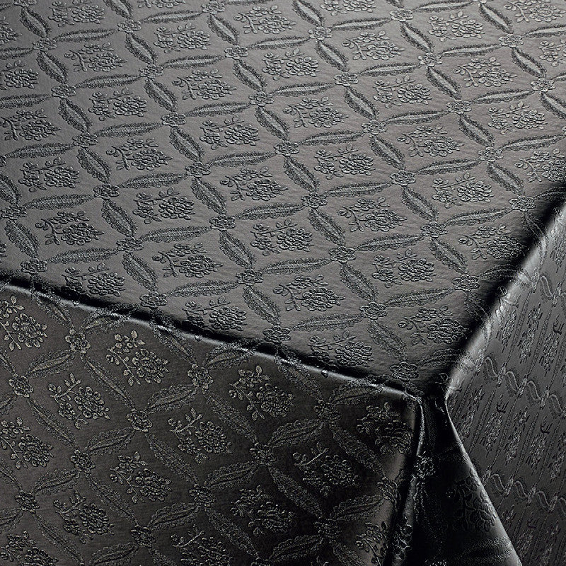 Rose Tapestry Black, svart damast präglad vaxduk på bordet