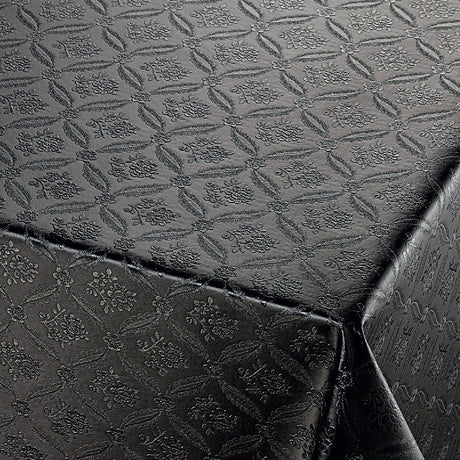 Rose Tapestry Black, svart damast präglad vaxduk på bordet