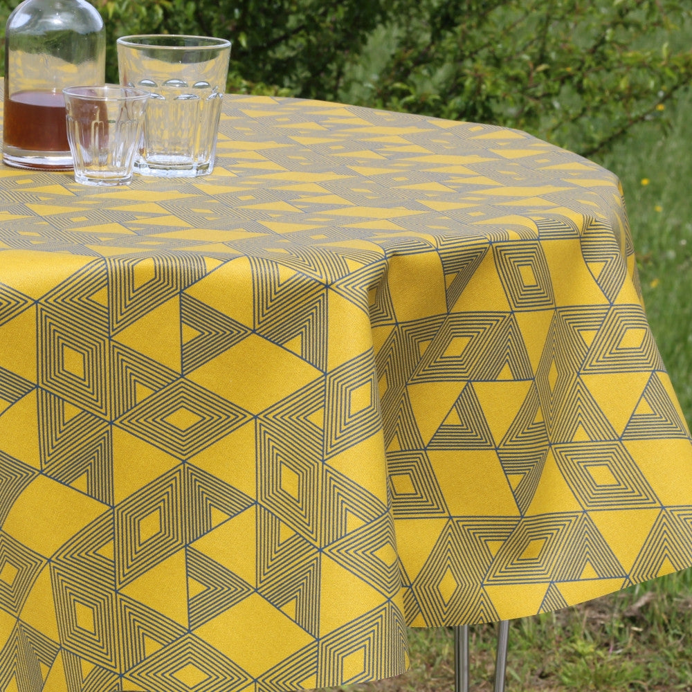 Cuzco Curry-gul/blå, textilvaxduk med grafiskt mönster - 140 cm bred