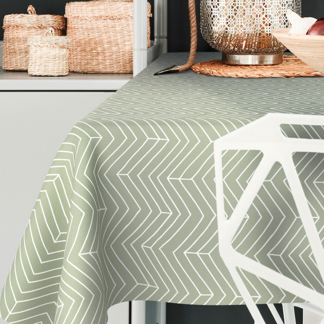 På bordet Sabila Sage – Vaxduk i skandinavisk stil med modernt fiskbensmönster