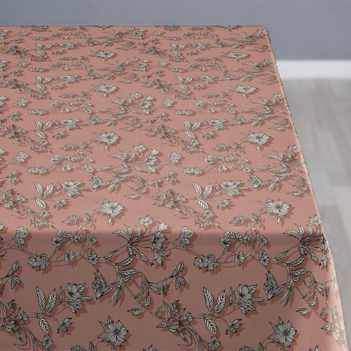 Närbild av Södahl Shadow Flower Terracotta, akrylatbelagd textilduk, med glidskydd