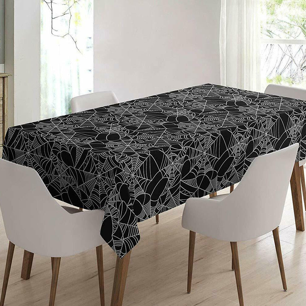 På bordet Spider Web - Halloween-vaxduk med läskigt svart spindelnät