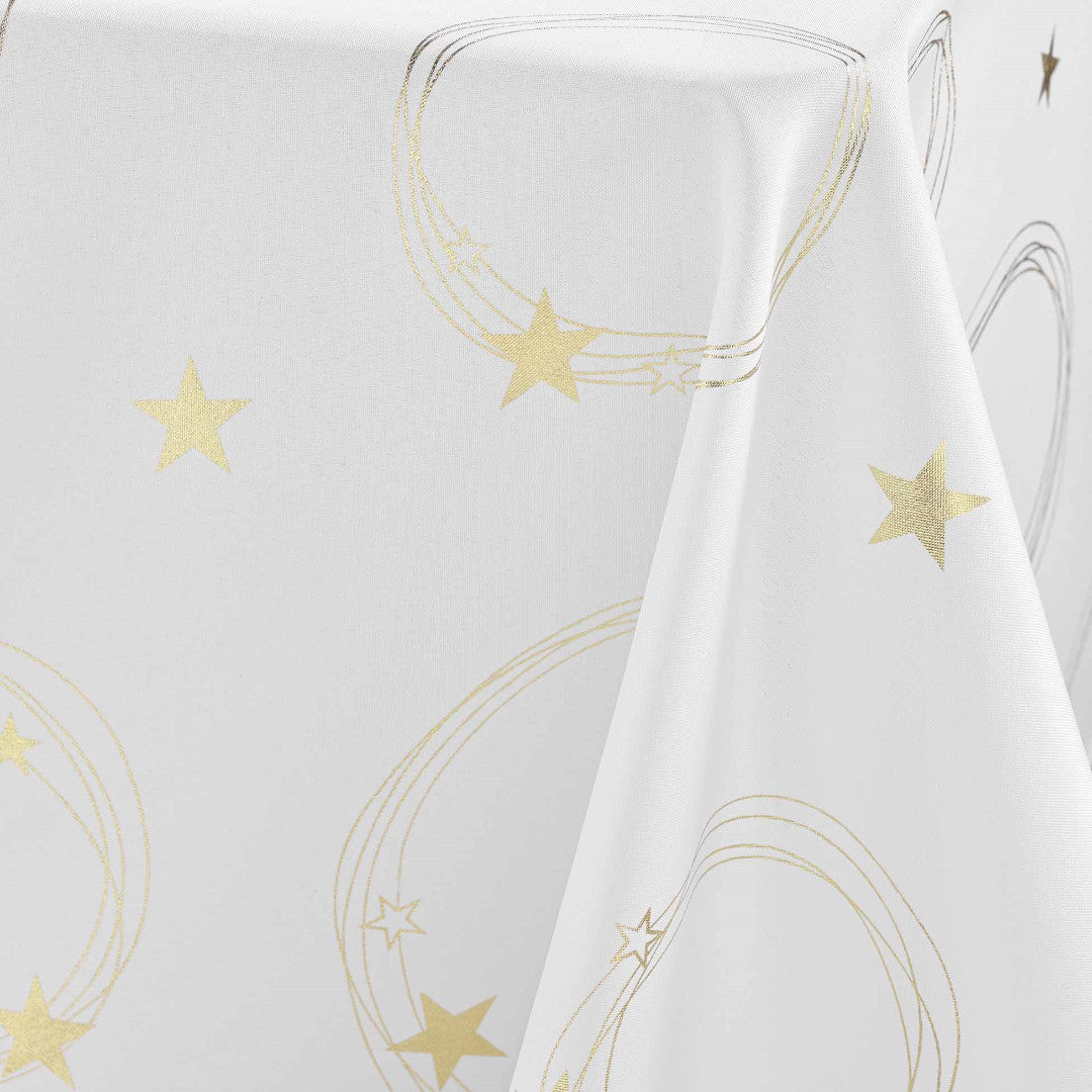 Närbild på Star 150 x 240 cm vit julduk med guld tryck