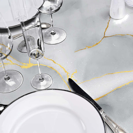 Bordet dukat med Textilia Glitter Marbrelle - Vaxduk med marmoreffekt, gyllene ådror och glitterdetaljer