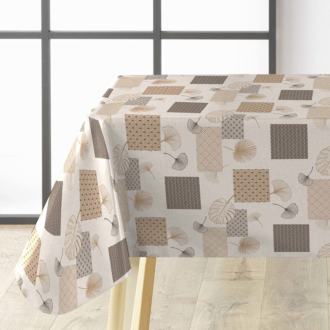 På bordet Textilia Glitter Rialto - Vaxduk med blad och art deco-inspirerade rutor