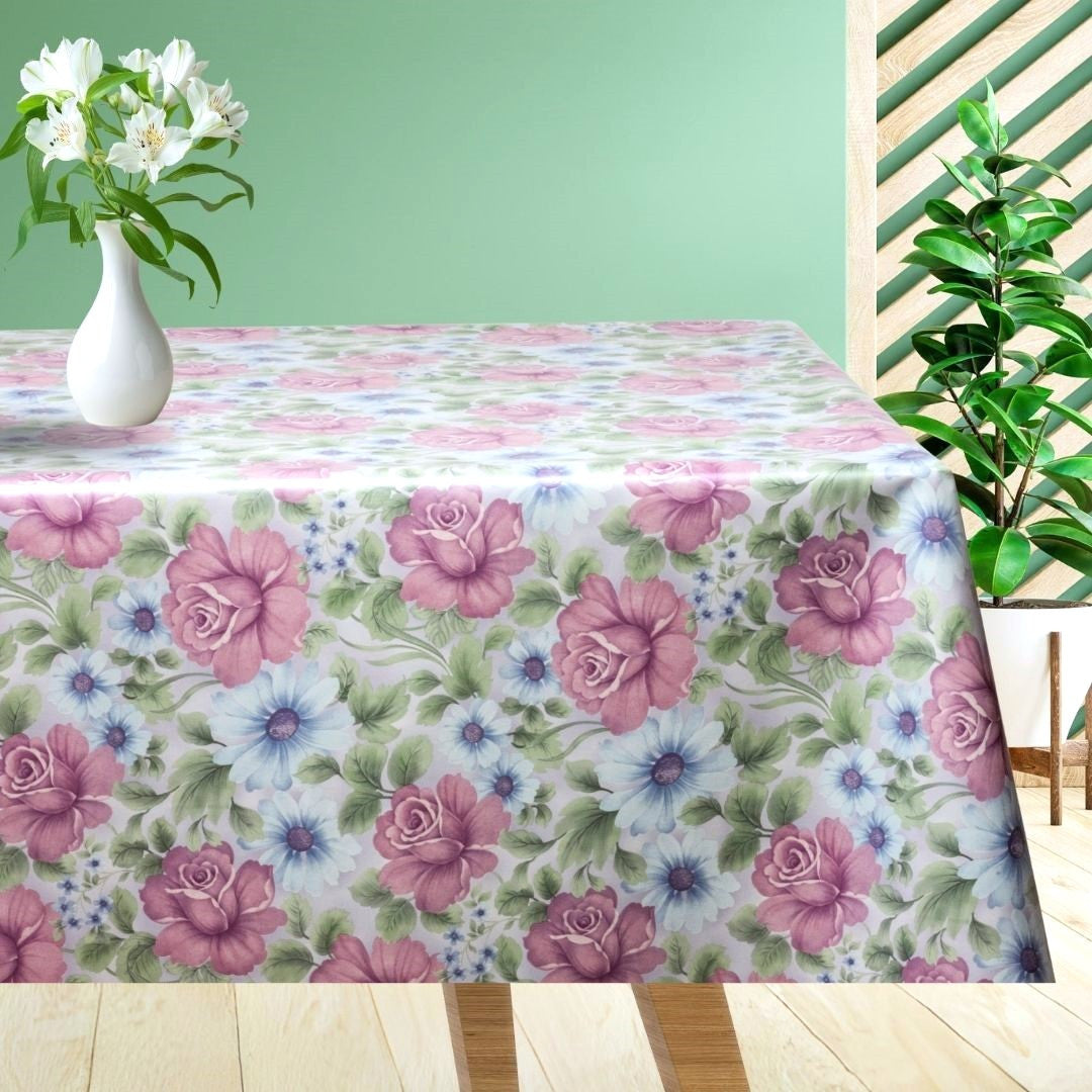 Vaxduk med vackra blommor i rosa och blåvioletta nyanser