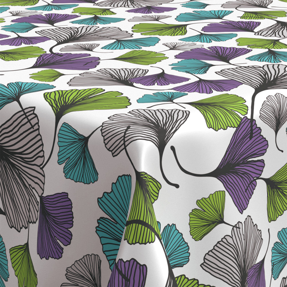 Närbild av Vaxduk med ginkgo biloba-blad i lila grön turkos grå
