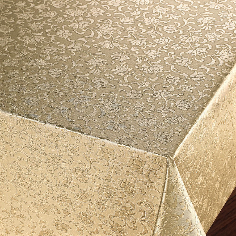 Rosenflor Guld - Vackert damastpräglad vaxduk. På bordet, hörn bild