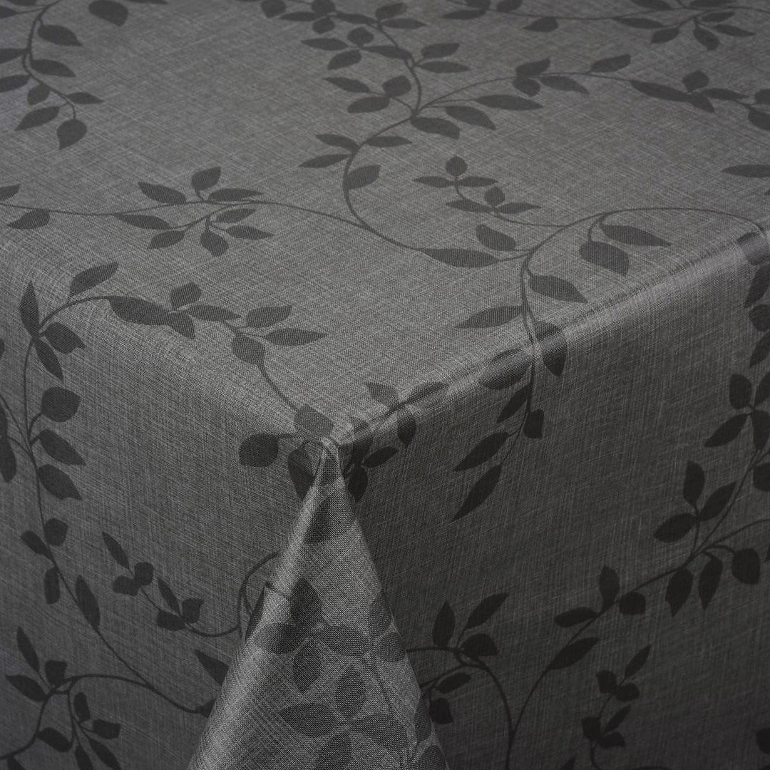 Närbild av Vaxduk Linette, linne-look med blad i antracit