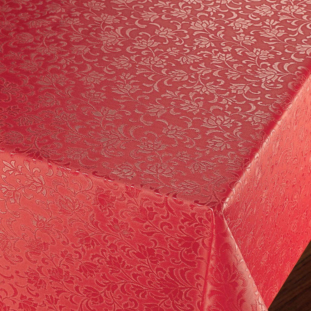 Rosenflor Röd - Vacker damastpräglad vaxduk. På bordet, hörn bild