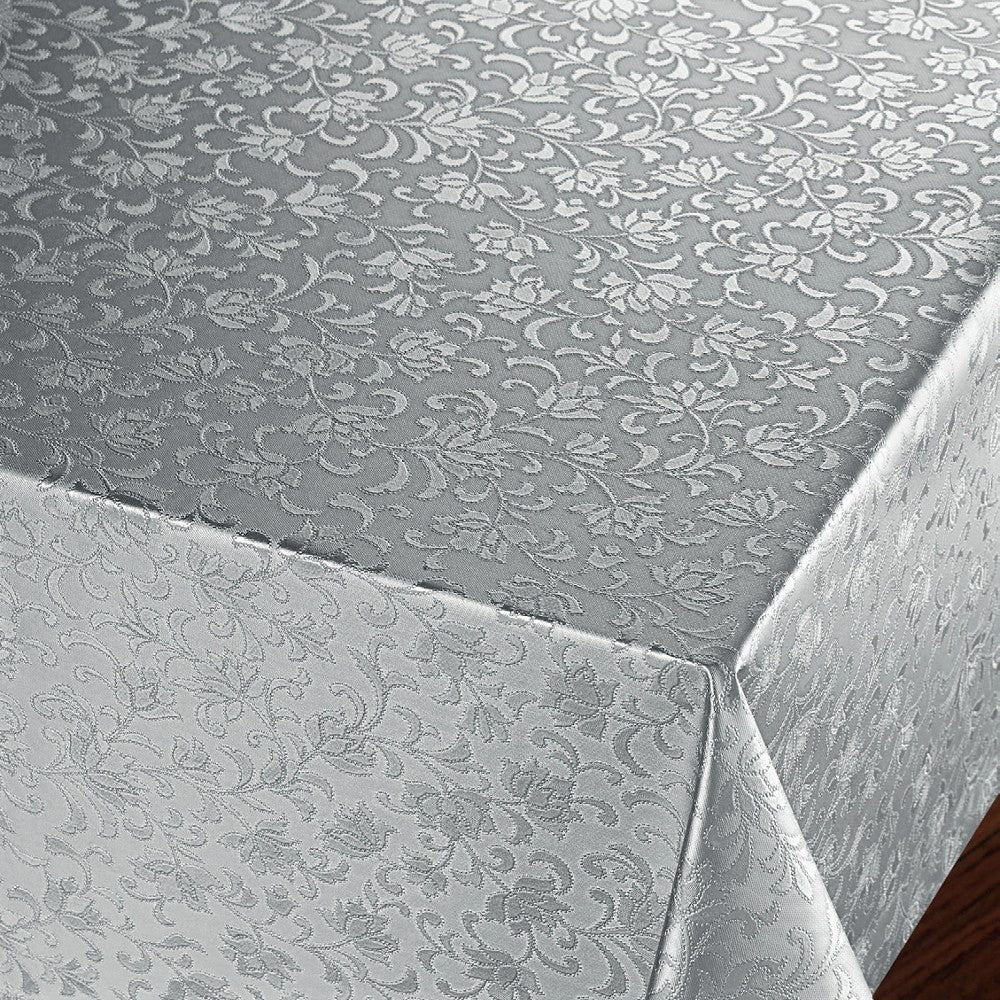 Rosenflor Silver - Vacker damastpräglad vaxduk. På bordet, hörn bild