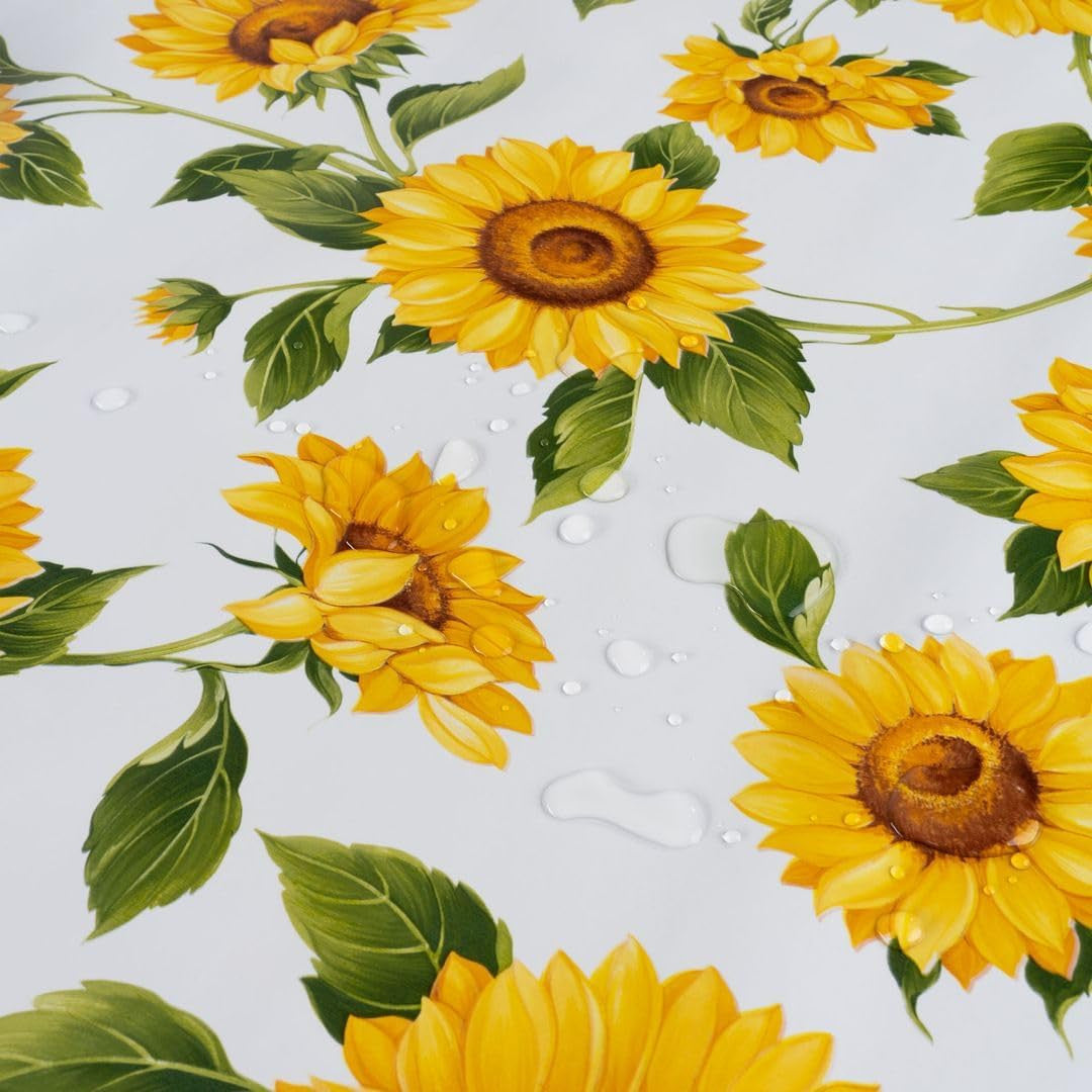 Solrosor - Vaxduk i gula och orange färger på vit botten, 140 cm