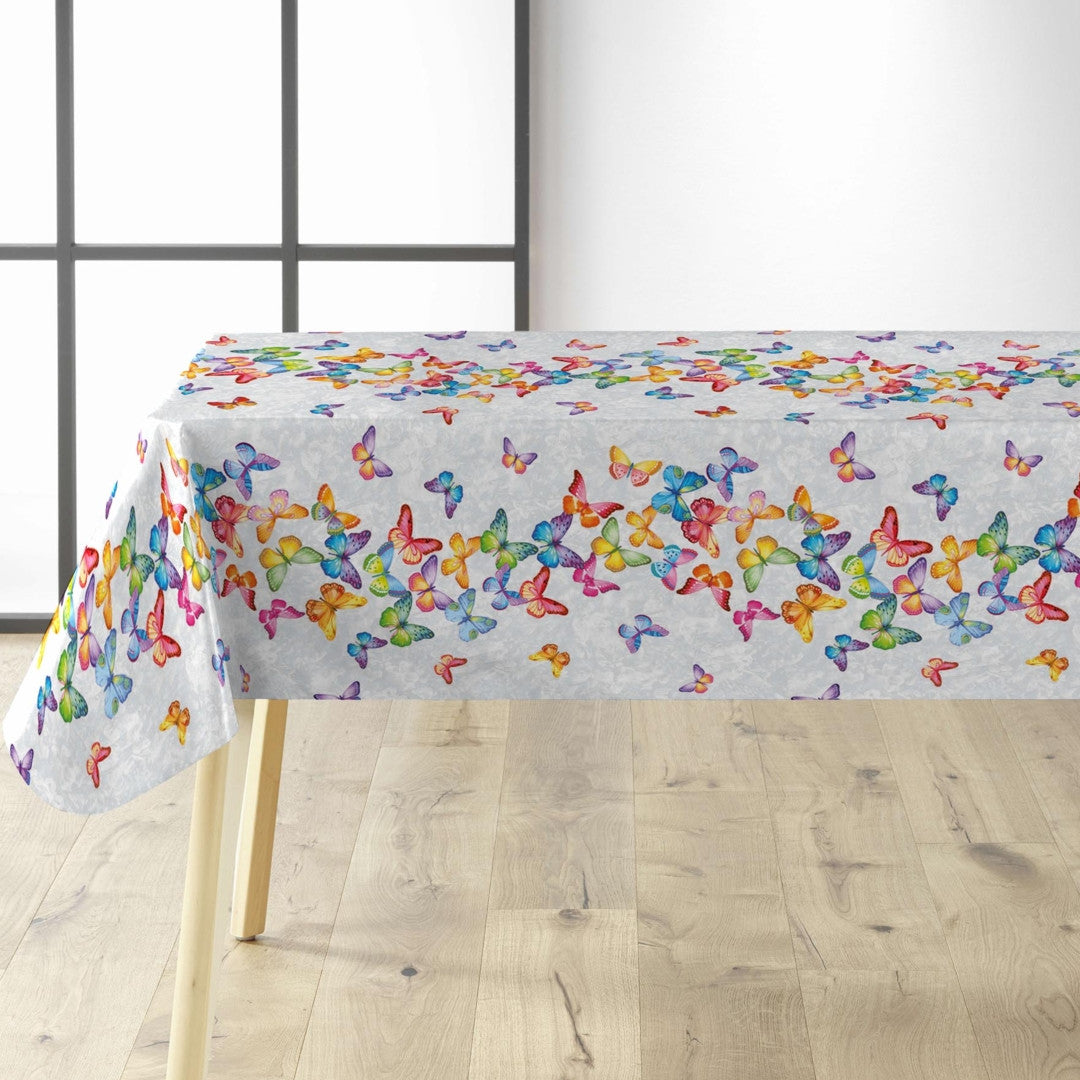 Vaxduk med fjärilar på rad i många färger